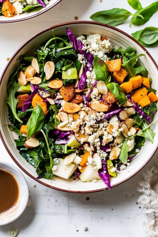 Immune-boosting kale, squash, purple cabbage, arugula, almonds, basil and pears are all tossed in a tangy-sweet dressing. To add more protein, you could add grilled shrimp or salmon.
