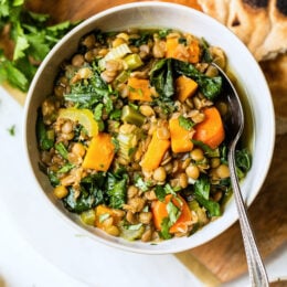 Make a big pot of this healthy, vegetarian (and vegan) Lebanese Lentil Soup, made with green lentils, kale, sweet potato, lots of garlic, ginger, and lemon.
