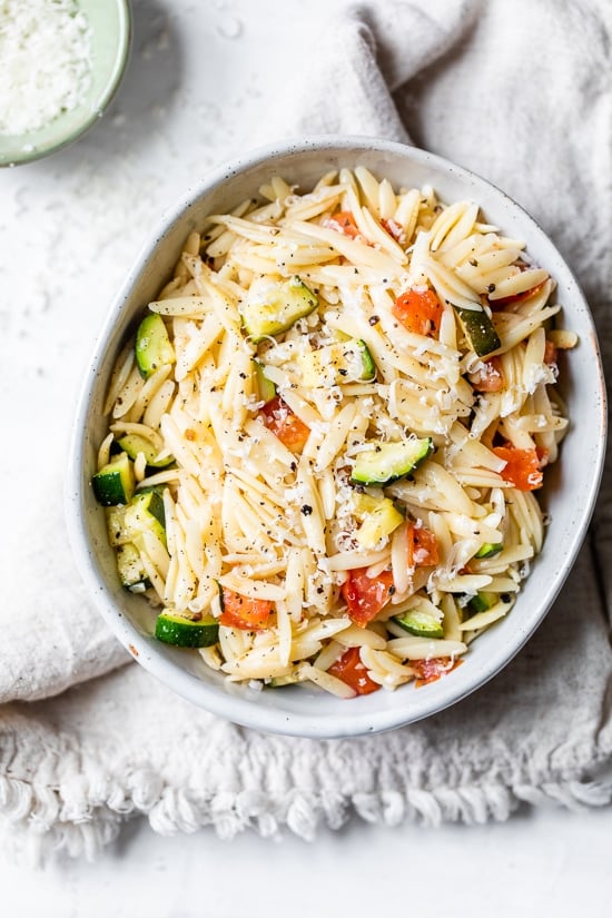 Orzo with Zucchini and Tomato is a quick and easy side dish that goes great with chicken, pork chops, or double the portion and enjoy it as a main dish.