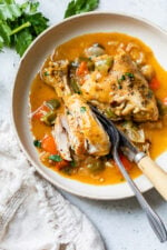 Paprika Chicken Stew is an easy weeknight dish made with chicken on the bone, bell peppers, and lots of Hungarian paprika.