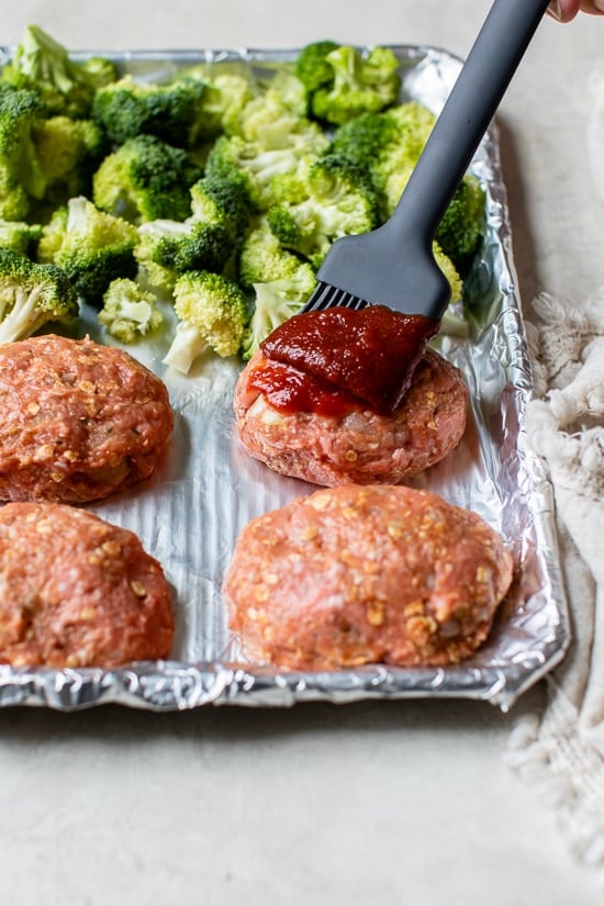 Sheet Pan Turkey Meatloaf and Broccoli made with individual loaves cooked on a foil-lined sheet pan for a quick meal with easy cleanup.