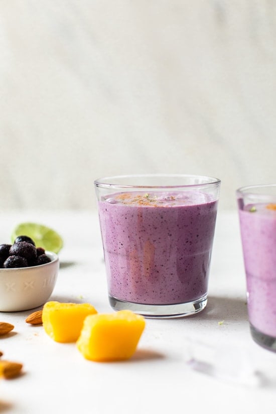 Tropical Lassi is a healthy, Indian yogurt drink blended with frozen mango, tart blueberries and spices.