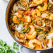 This easy seafood paella, made with shrimp, clams and chorizo is a delicious one-pot dish!