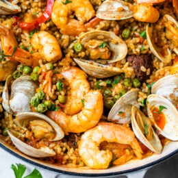 This easy seafood paella, made with shrimp, clams and chorizo is a delicious one-pot dish!