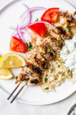 Grilled Chicken Kabobs on a plate with rice pilaf