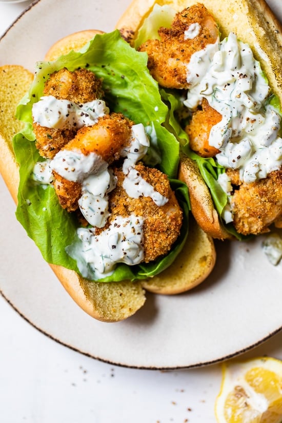 Air Fryer Shrimp Sandwich is made with crispy shrimp served on a soft potato bun with lettuce and homemade tartar sauce, the perfect summer sandwich.