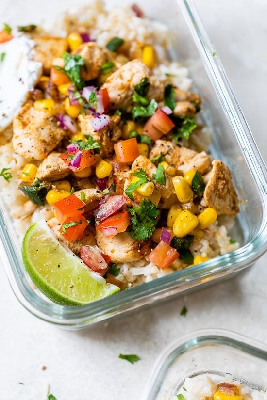Chicken Taco Poblano Rice Bowls in a glass meal prep container.