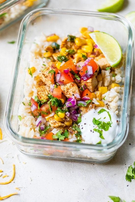 Chicken Taco Poblano Rice Bowls in a glass meal prep container.