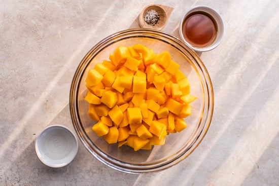This easy maple roasted butternut squash is a quick fall side dish with cubed squash tossed in pure maple syrup. Perfect for holiday dinners! Maple roasted butternut squash ingredients.