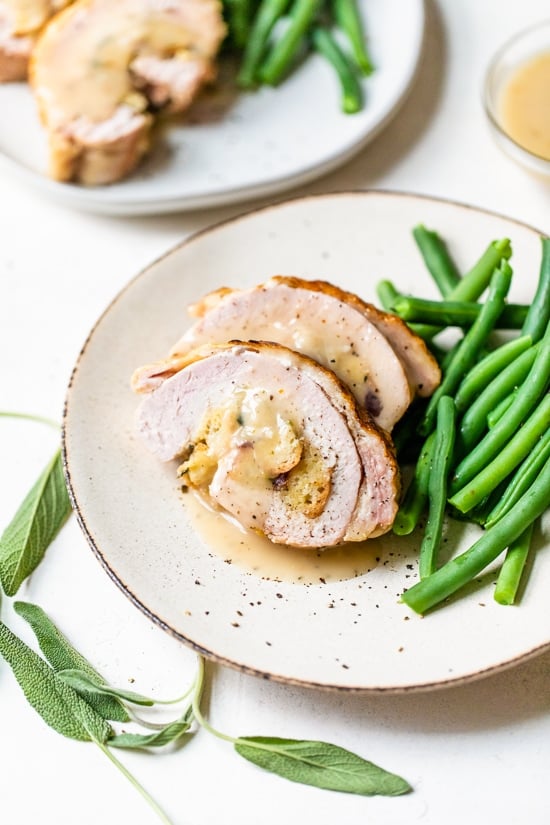 Stuffed Turkey Breast with Cranberry Stuffing with green beans.