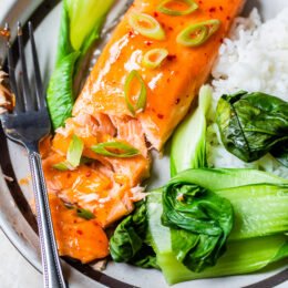 Sweet and Spicy Baked Salmon with rice and bok choy.