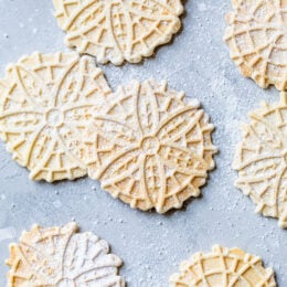Pizzelle Cookies with powdered sugar