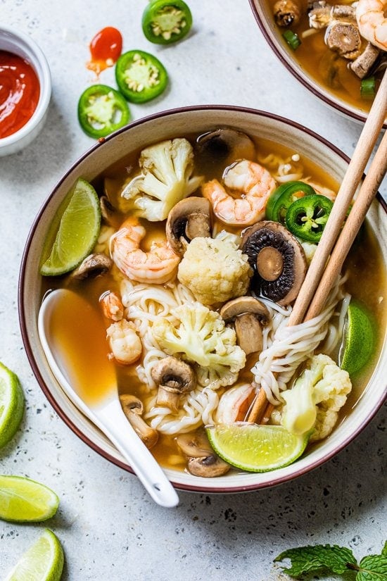 Shrimp noodle soup with chopsticks
