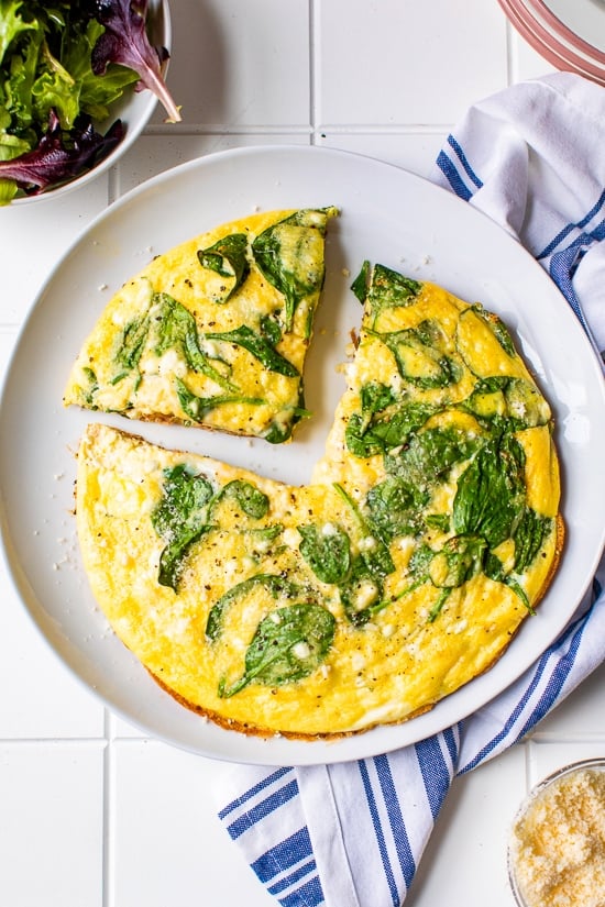 Frittata with a wedge cut.