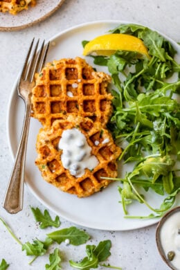 Waffled Salmon Cakes with arugual and lemon