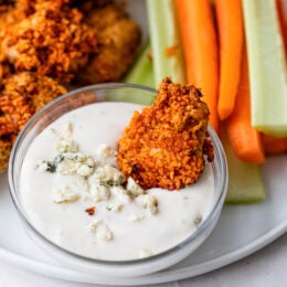 Crispy, spicy Air Fryer Buffalo Chicken Nuggets are perfect for the big game or enjoy them for lunch, or dinner.