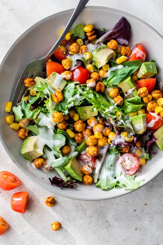 salad topped with air fryer chickpeas