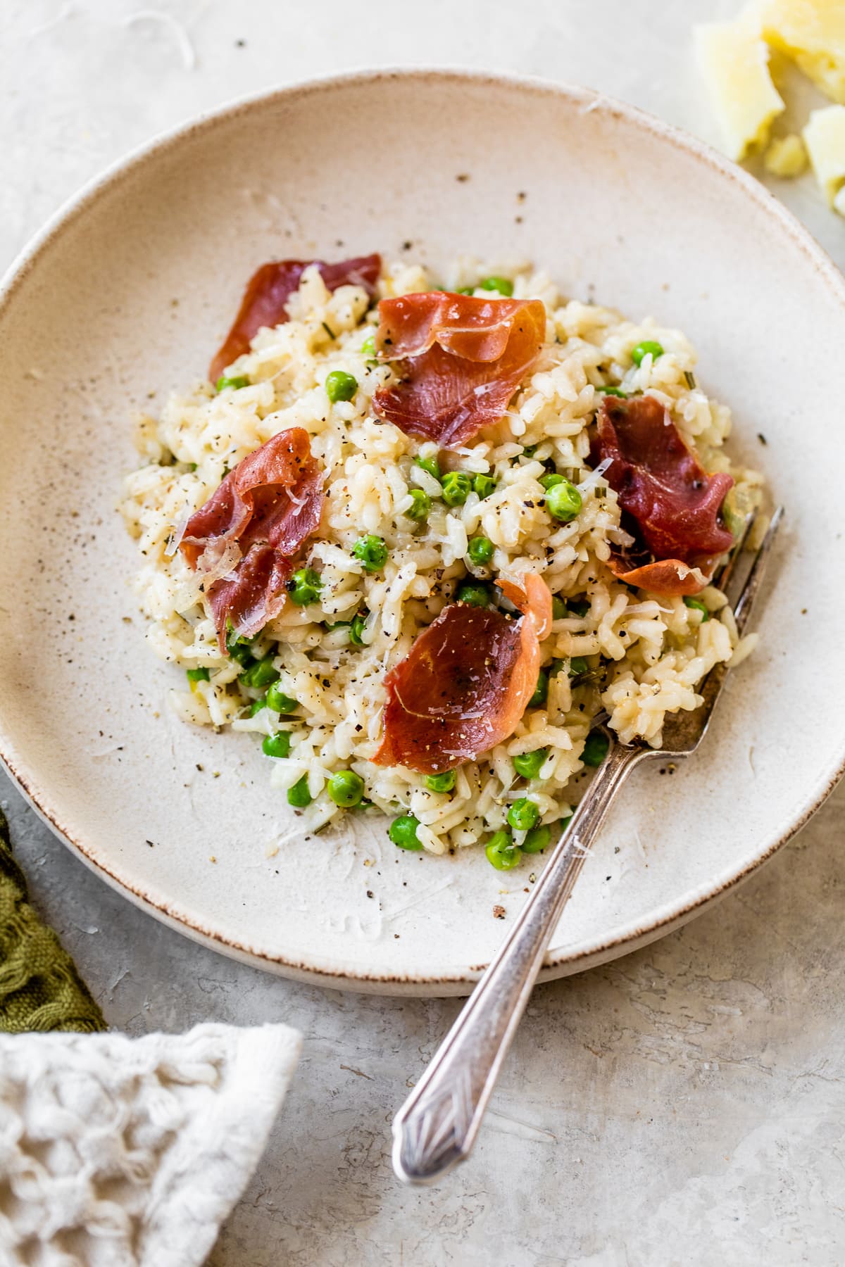 Overhead view of a bowl of Instant Pot risotto with prosciutto