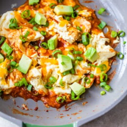 Enchilada Scrambled Eggs with cheese and avocado