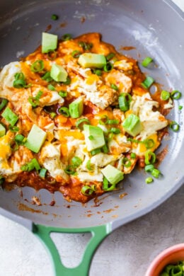 Enchilada Scrambled Eggs with cheese and avocado