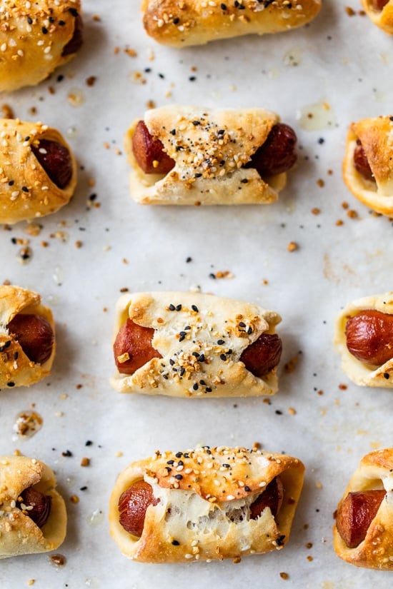 Mini Bagel Dogs, or pigs in a blanket, make a great game day appetizer or kid-friendly after-school snack!