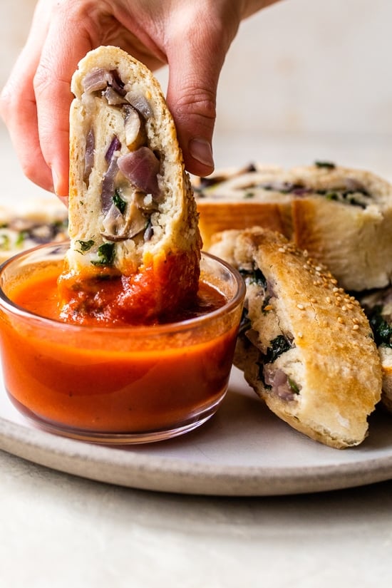 Mushrooms, spinach and cheese stromboli