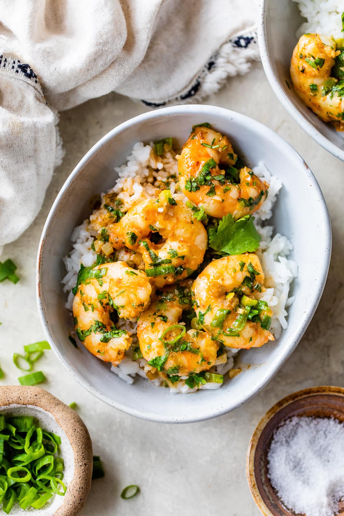 shrimp over rice in a bowl