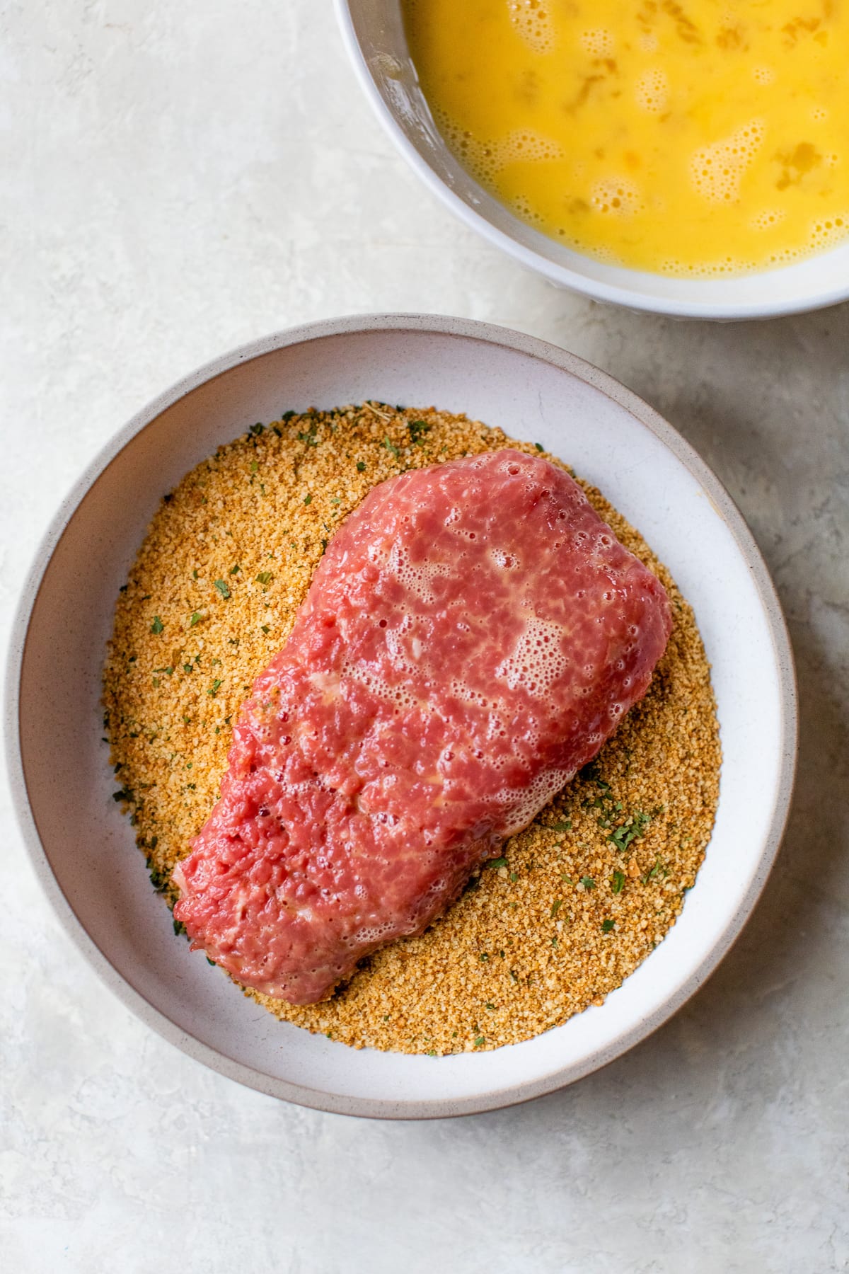 diced steak with egg and bread crumbs