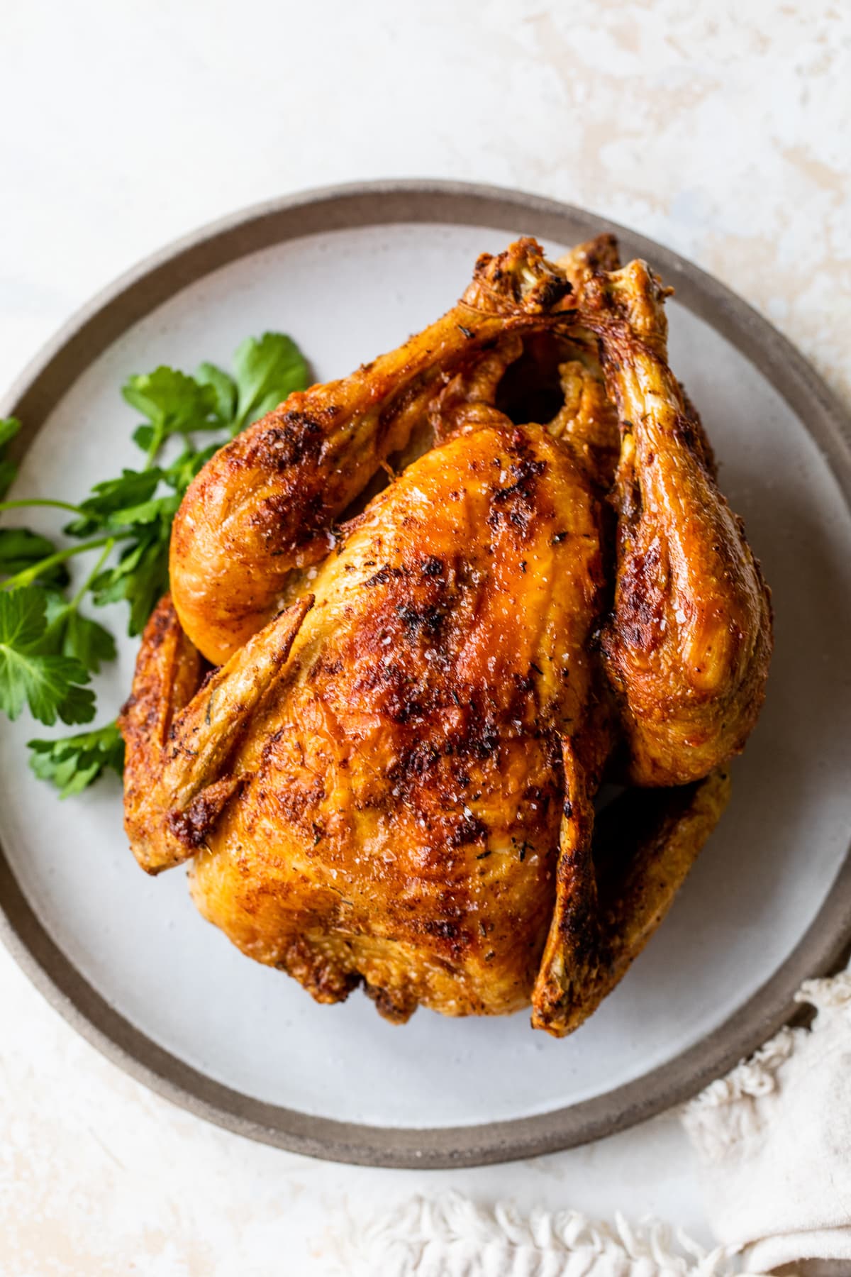 Air Fryer Rotisserie Hen (Juicy and Crispy Pores and skin)