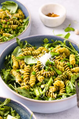 Pesto Pasta with Arugula in a large bowl.