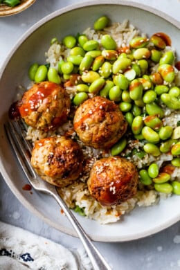 Air Fryer Asian Turkey Meatballs with rice and edamame.
