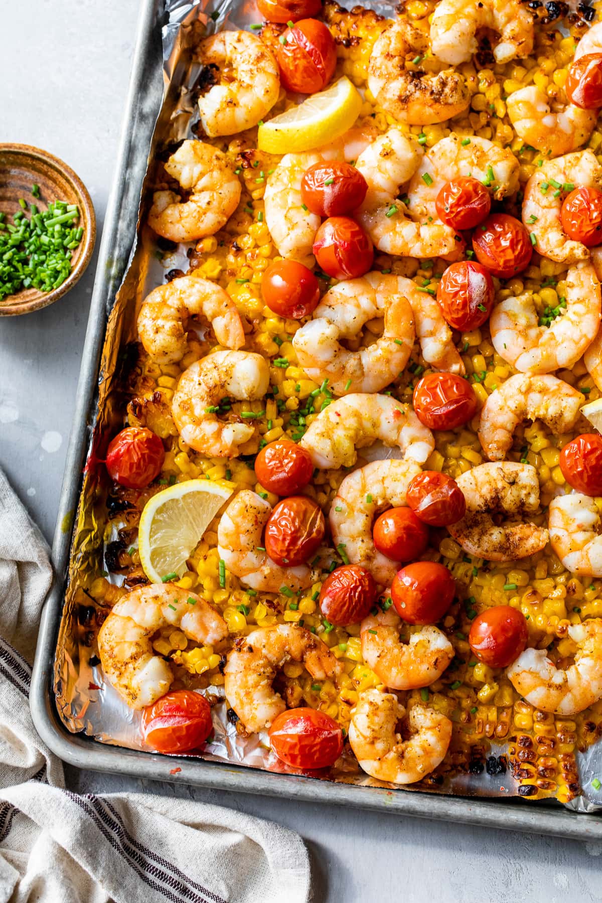 Old Bay Sheet Pan Shrimp with Corn and Tomatoes
