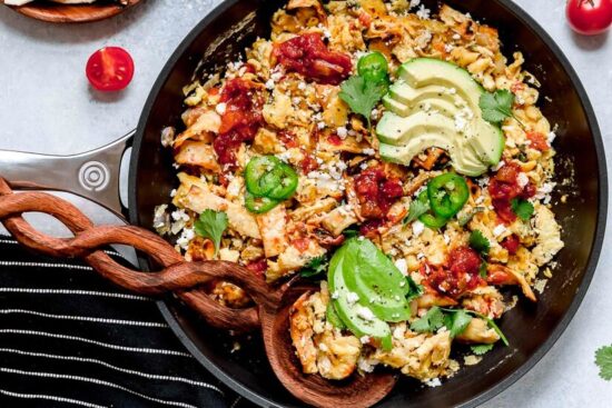Migas is a popular Tex Mex egg dish made with c،pped corn tortillas, cheese, tomatoes, jalapeños, and onions. I serve it plated with tortillas on the side, but they can also be wrapped in a tortilla, taco style.
