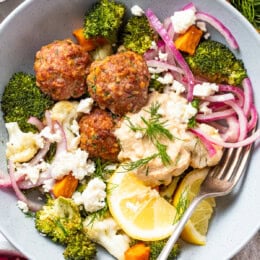 Sheet pan Mediterranean meatball bowls with roasted vegetables, turkey meatballs and hummus