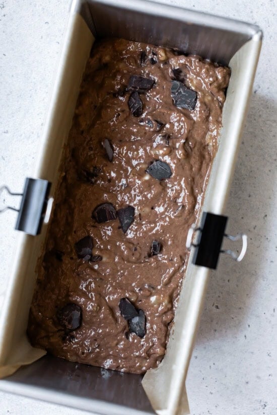 chocolate banana bread batter in loaf tin