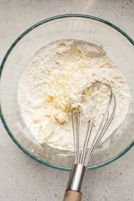 Mix dry ingredients and fold in cold butter